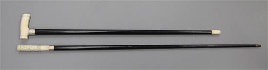 An ebonised cane, 32.5in.